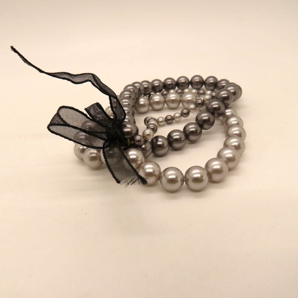 Roman RMN Bracelet Silver Gray Imitation‎ Pearl Bead Stretch Black Bow Accent